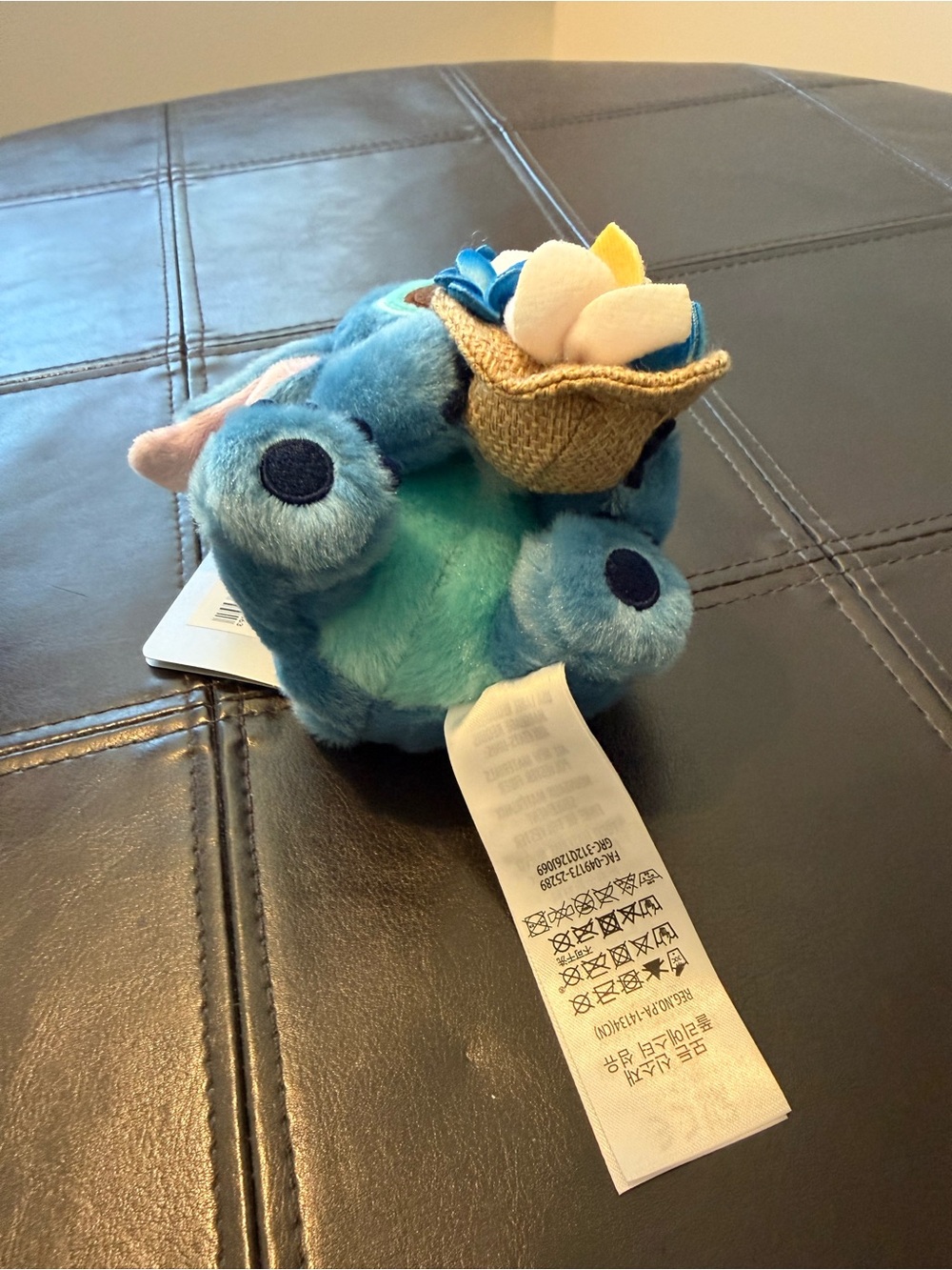 Disney Blue Stitch Plush Keychain with Multicolor Floral Lei - Picture 4 of 5